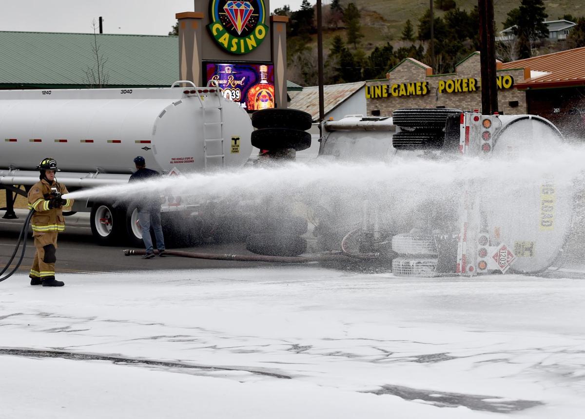 Fuel tanker tips on Airport Road, spills diesel on roadway Local