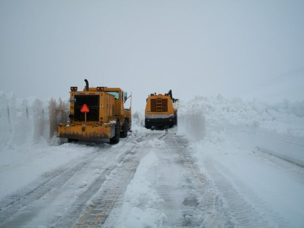 Wyoming Department of Transportation crews plow U.S. Highway 14A 