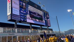 Montana State flag handoff, sweater presentation before 2026 Gold Rush game