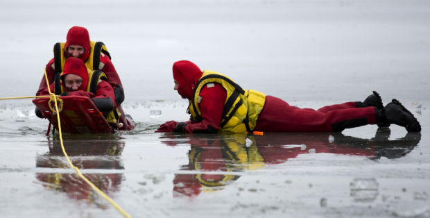 Firefighters practice ice-rescue tactics on Lake Elmo