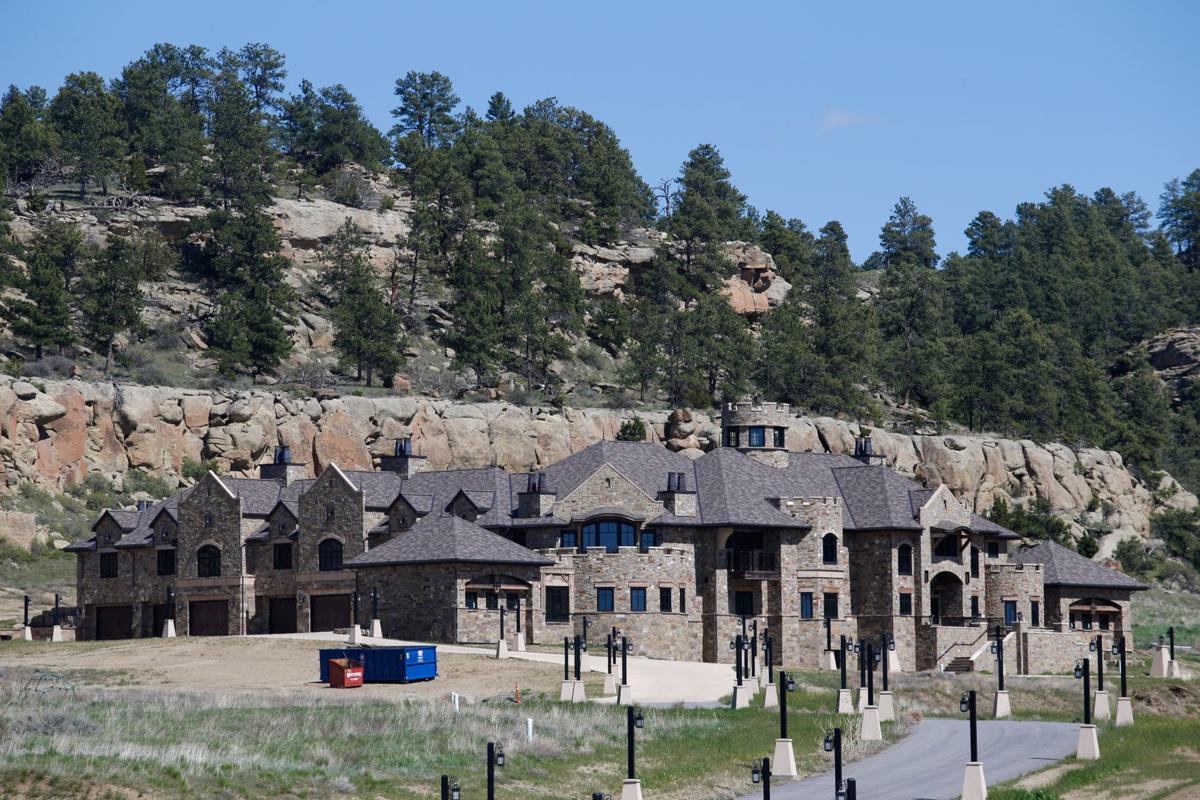 Man behind massive Billings mansion in federal custody after apparently