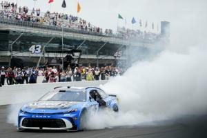 NASCAR Cup Series driver Corey Heim (67) celebrates Sunday, July 26, 2026, after winning the Brickyard 400 at Indianapolis Motor