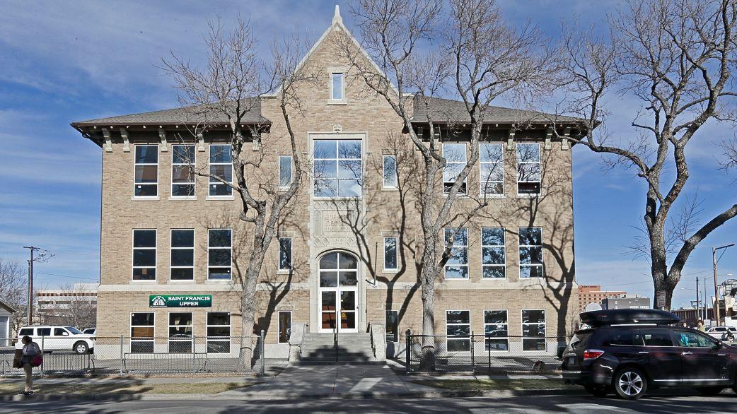 Catholic church wants to sell old school building, but first it needs permission from 434 heirs