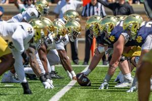 Apr 25, 2026; Notre Dame, IN, USA; Notre Dame Fighting Irish players line up on offense and defense during the Blue-Gold game at Notre Dame Stadium. Mandatory Credit: Michael Caterina-Imagn Images