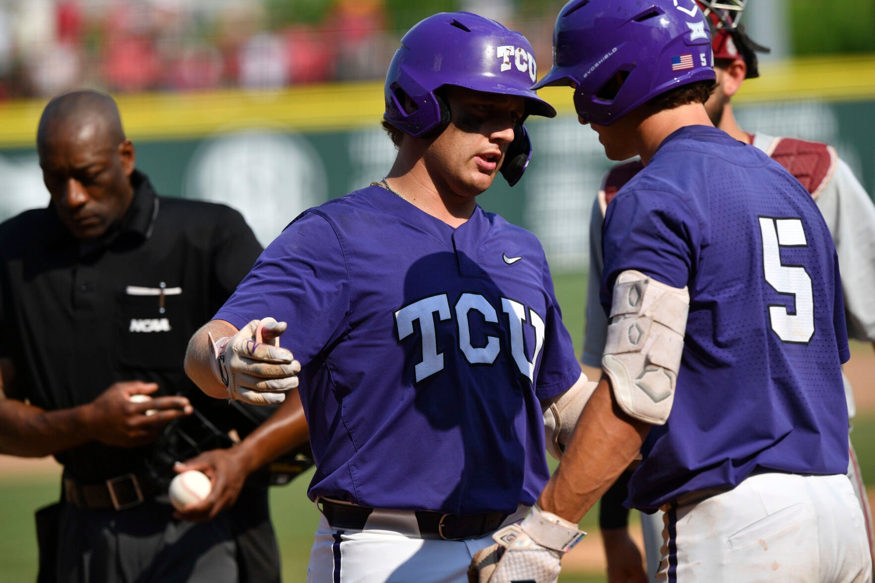 Baseball team with purple 2024 uniforms