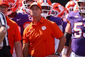 Clemson coach Dabo Swinney prepares to run on the field with his team before its game against Georgia Tech at Bobby Dodd Stadium at Hyundai Field in Atlanta.