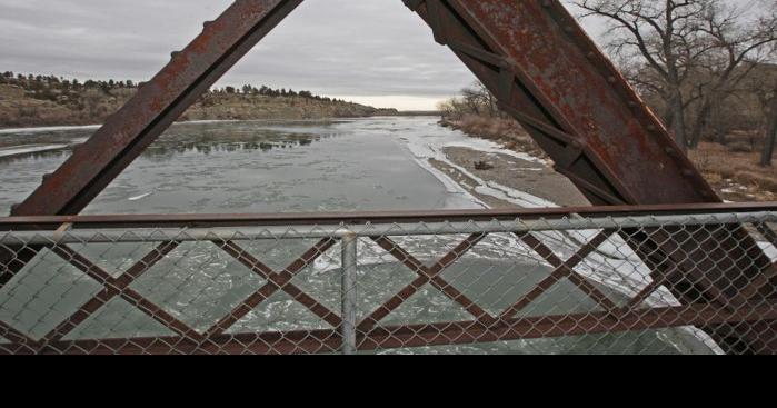 The old Bundy Bridge frames the Yellowstone River
