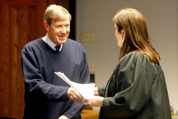 Brent Cromley is congratulated by judge Sheila Kolar