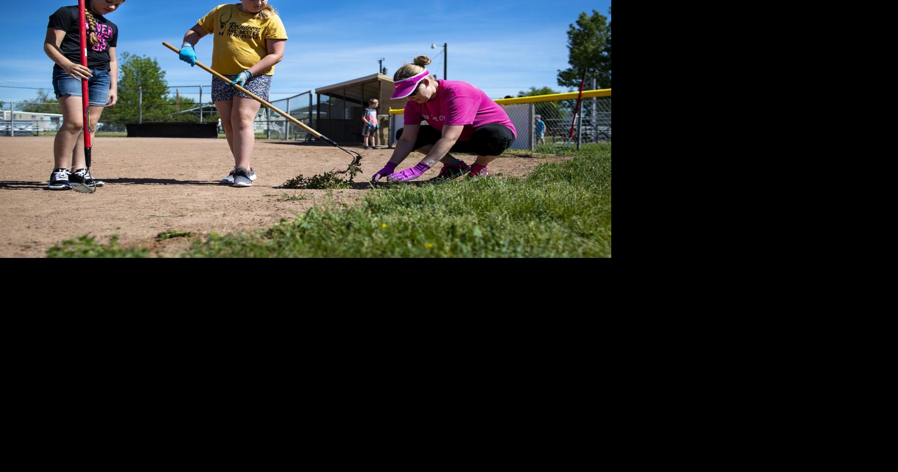 Photo: Heights National Little League field clean up