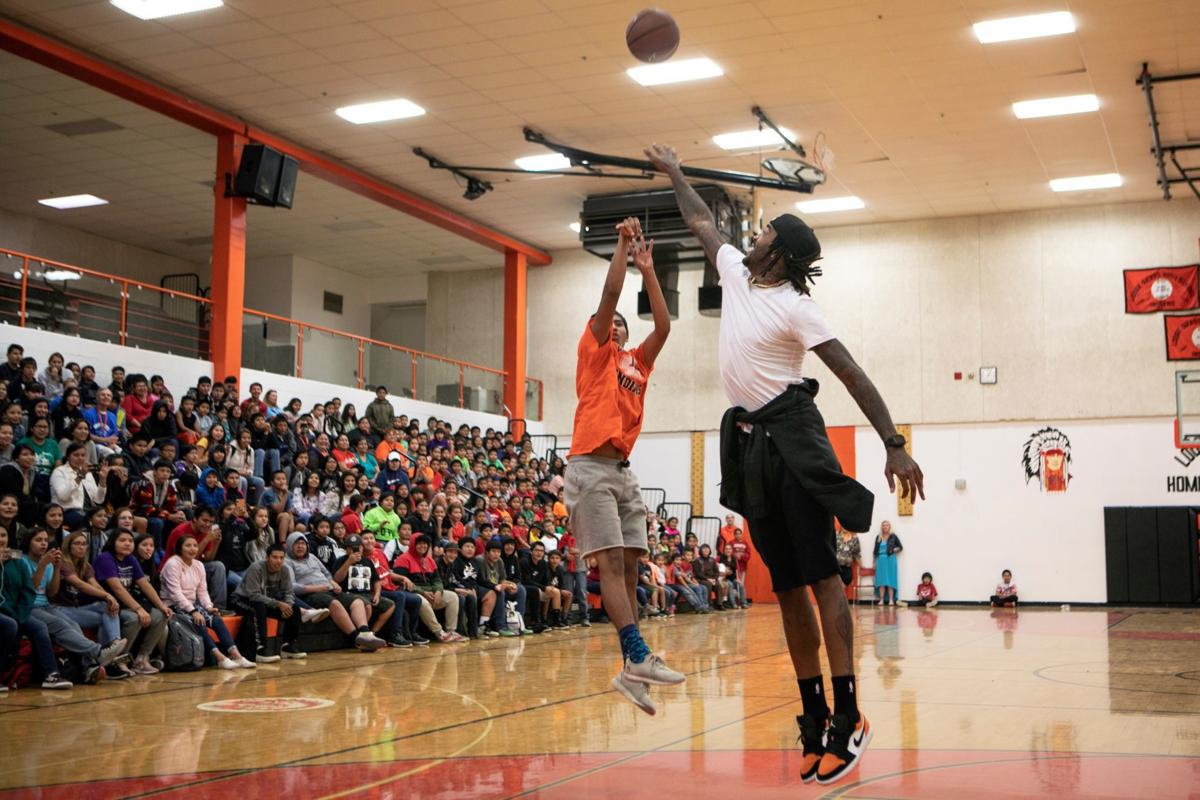 Former NBA player Jordan Hill visits Lodge Grass on Native American