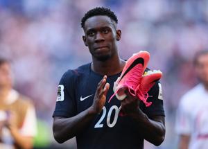 Folarin Balogun of the U.S. looks dejected as he applauds fans after the match following their elimination from the World Cup.