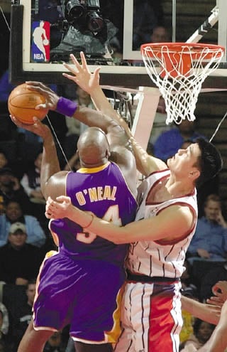 Shaquille O'Neal of Los Angeles Lakers and Yao Ming of the Houston