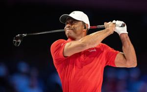 Tiger Woods of Jupiter Links GC tees off during match against Los Angeles Golf Club during the TGL finals at SoFi Center on March 24.