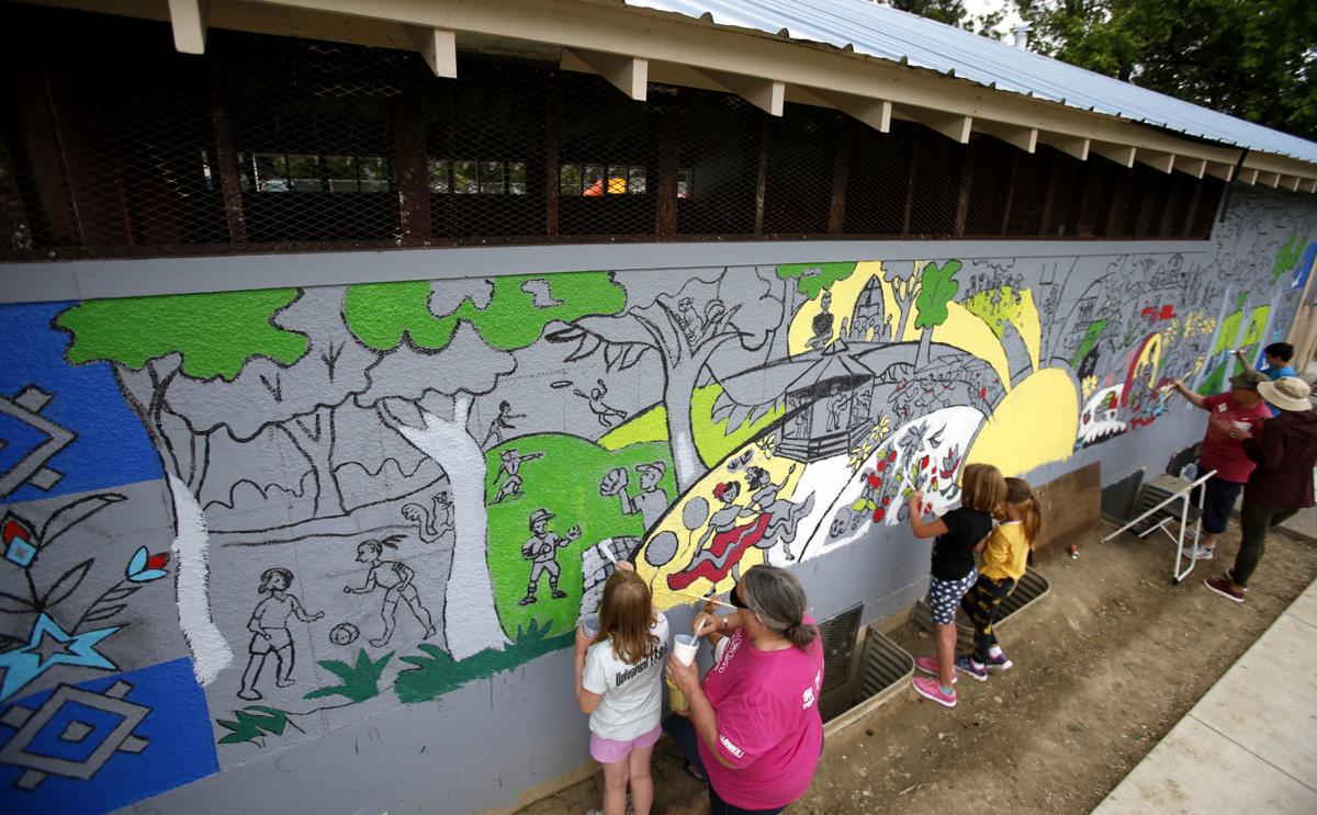 Photos Volunteers Paint Mural In South Park Local News