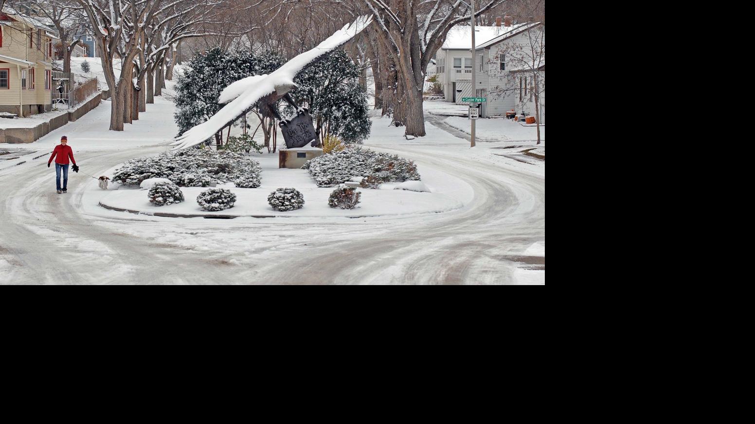Snow, cold, gusty winds push through North Dakota Bismarck