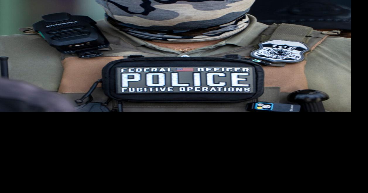 ICE agents and FHP troopers at the El Quetzal Panaderia Y Cafeteria on July 9, 2026 in Lake Worth Beach, Florida.