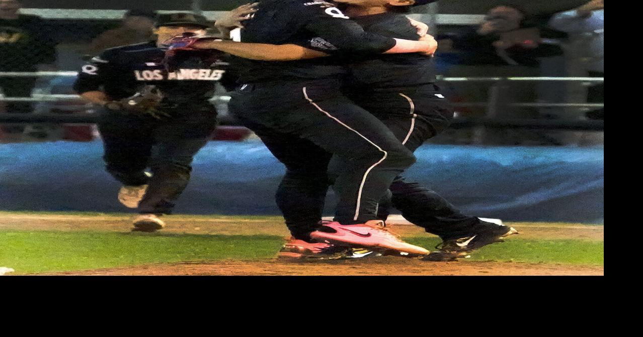 Coverage image for: Los Angeles Queens' Ayami Sato, right gets a hug from teammate Ashton Landsdell after they defeated the San Francisco Firebells at the Women's Pro Baseball League championship series Game 5 Tuesday Sept. 22 2026.