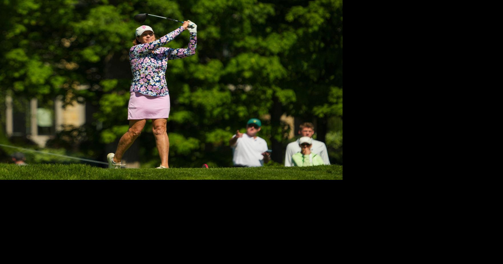 Former professional golfer Juli Inkster tees off on 18 during the Workday Golden Bear Pro-Am at Muirfield Village Golf Club on