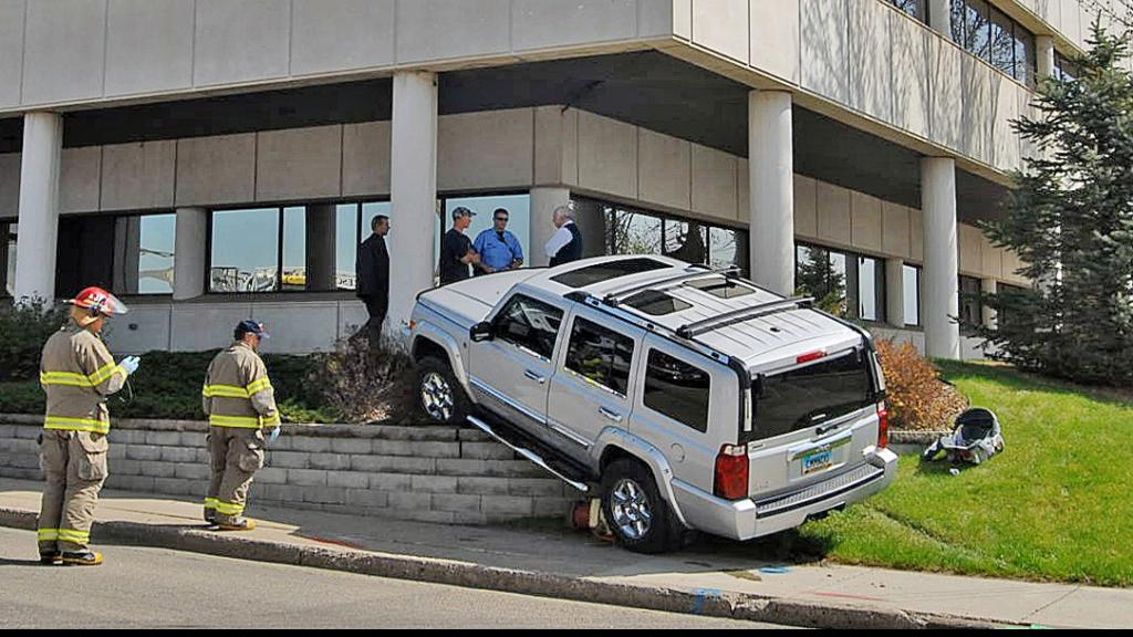 Jeep crashes into retaining wall outside Tribune offices Bismarck