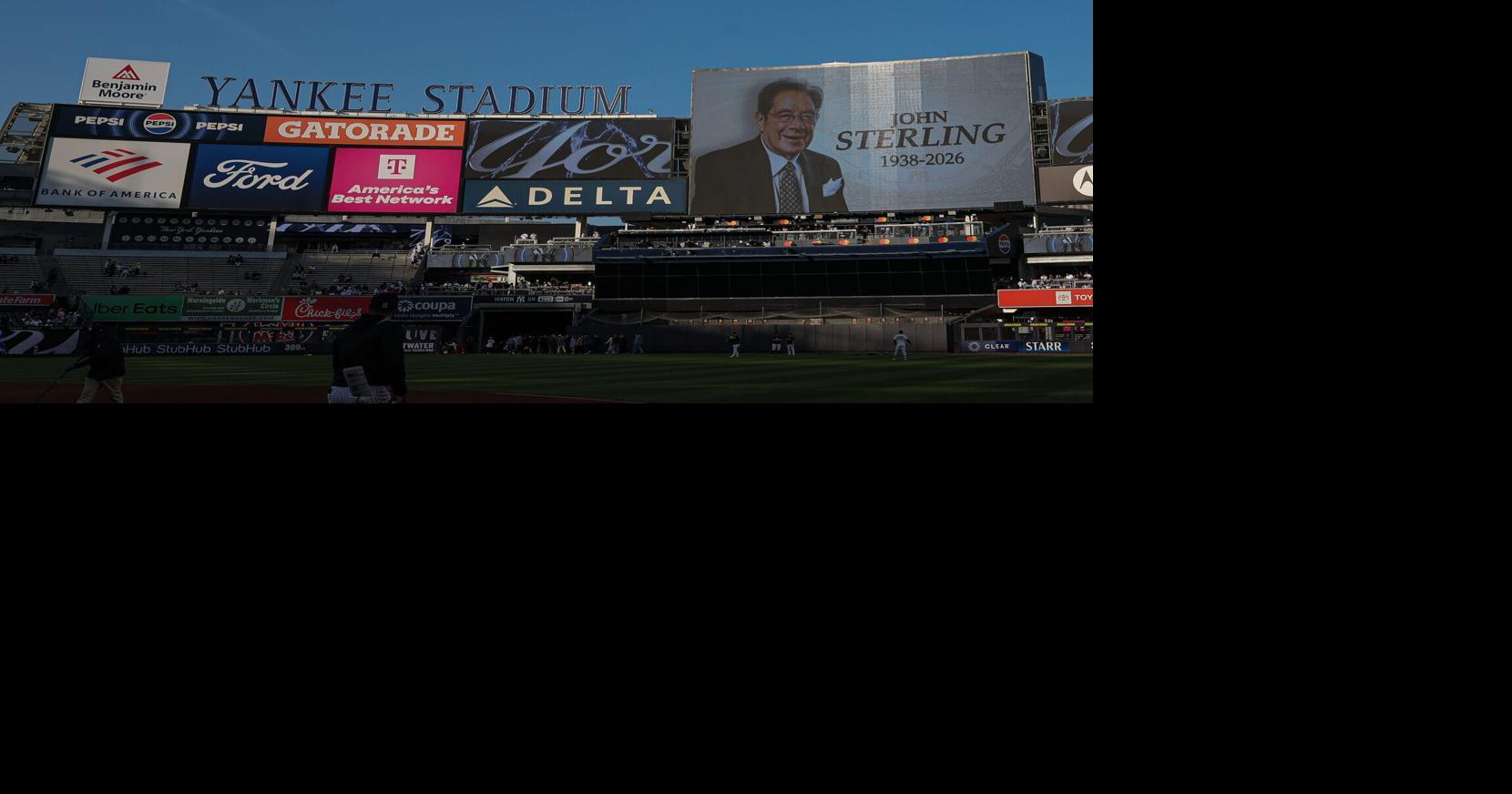 The main scoreboard displays a message honoring John Sterling, the Yankees radio play-by-play announcer before the game between the New York Yankees and Baltimore Orioles at Yankee Stadium on May 4, 2026.