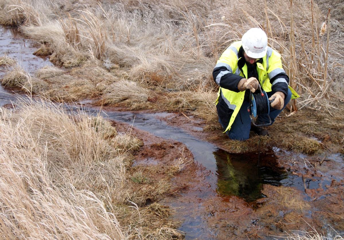 Decades later, holes drilled in search for oil now flooding land