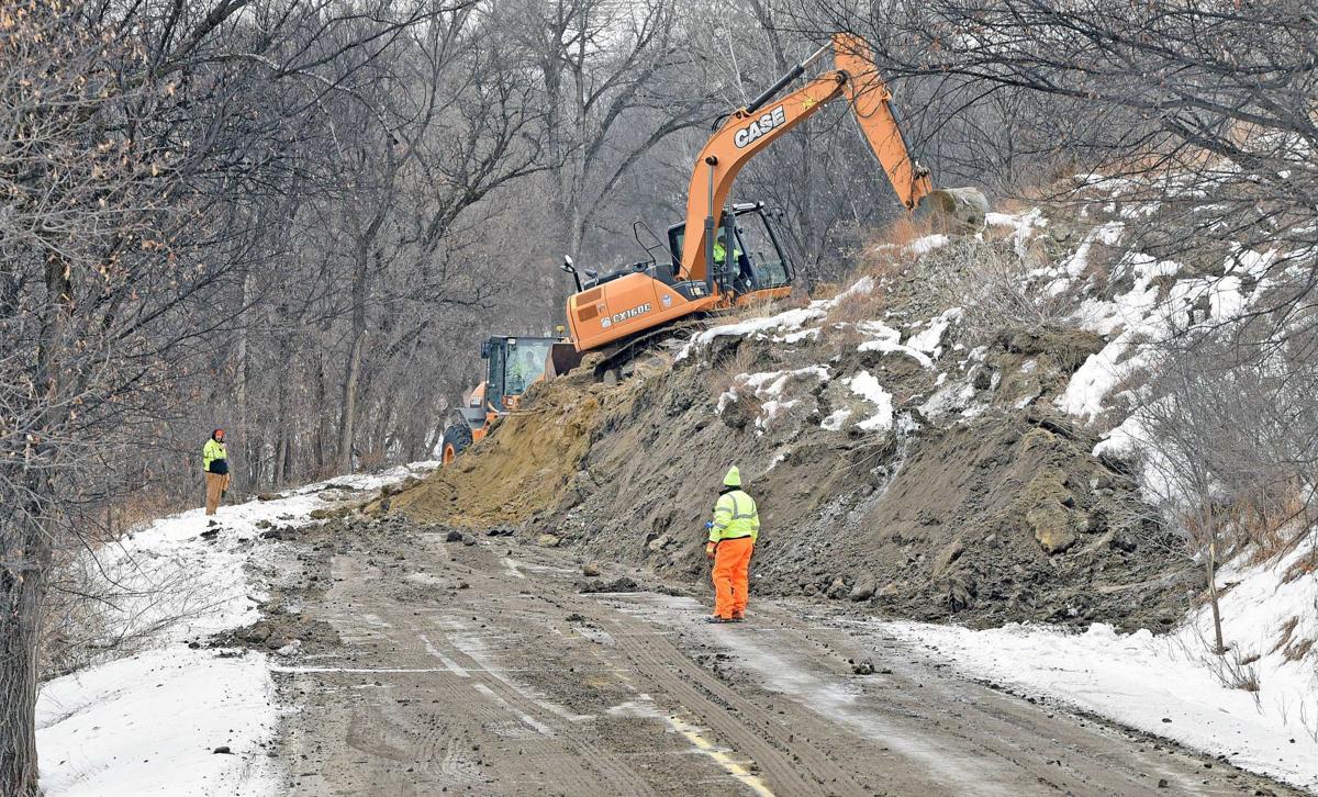 Burleigh County begins clearing River Road landslide
