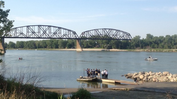 Authorities identify man who jumped from bridge; divers narrow search area