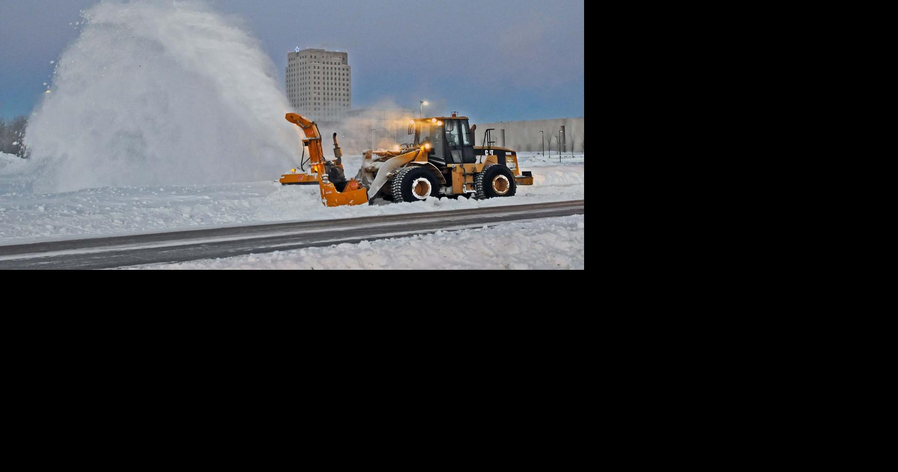 Interstate reopened as plows continue to clear city streets
