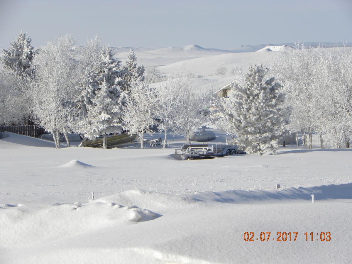 Morning Sun on Snowy Buttes