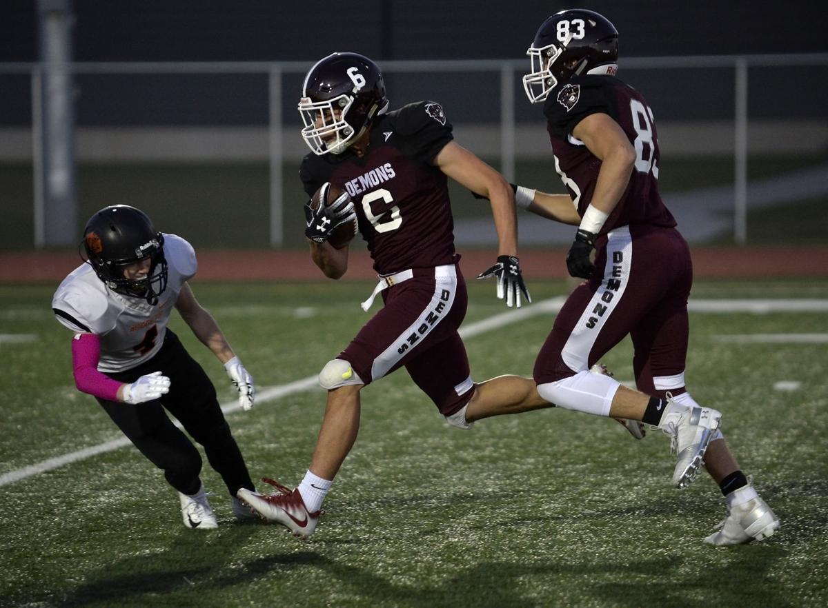 No. 1 Demons cruise past Dickinson Football