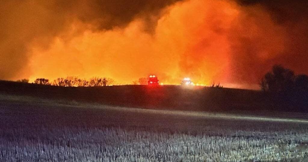 Western North Dakota wildfires prompt evacuations, kill 1