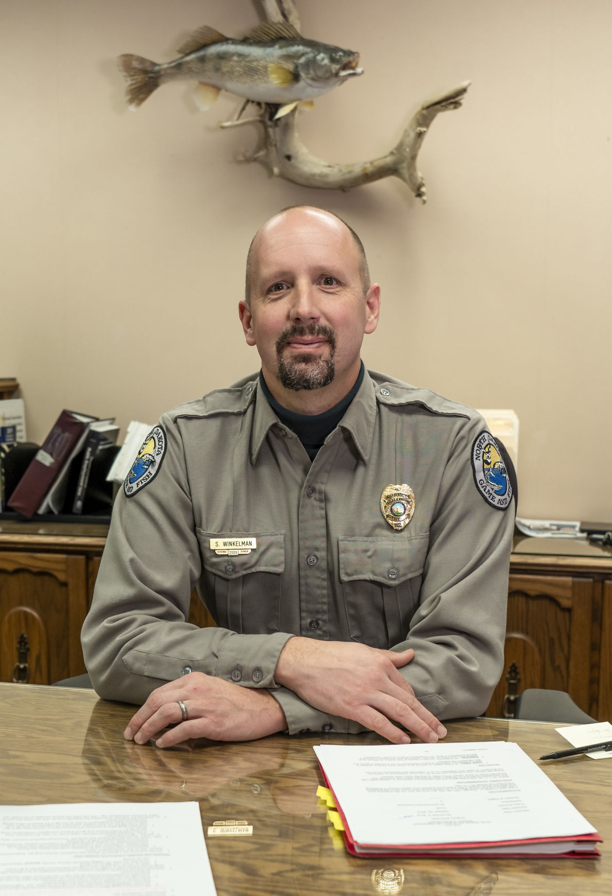 Warden's Watch - Life-saving badge of Game Warden Wayne