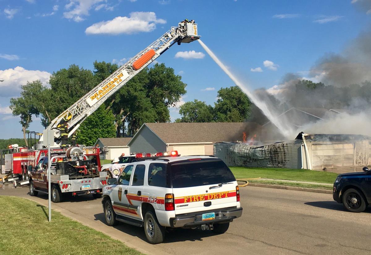 Crews respond to Mandan fire in Marina Bay Mandan
