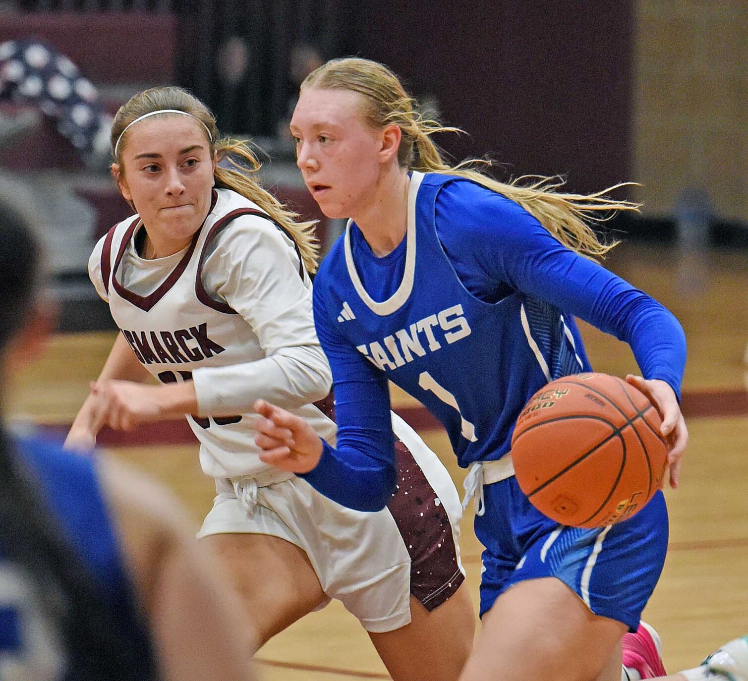 Bismarck Basketball Teams Close Conference Schedule with Victories – Paige Breuer Scores Game-High 26 Points