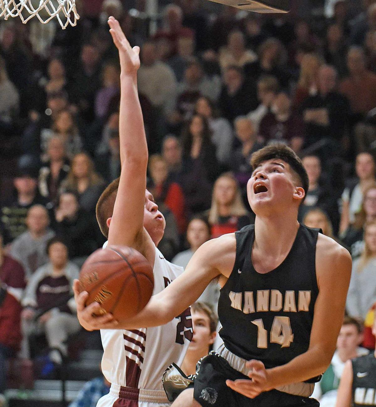 Balanced Scoring Leads Bhs Over Mandan Basketball