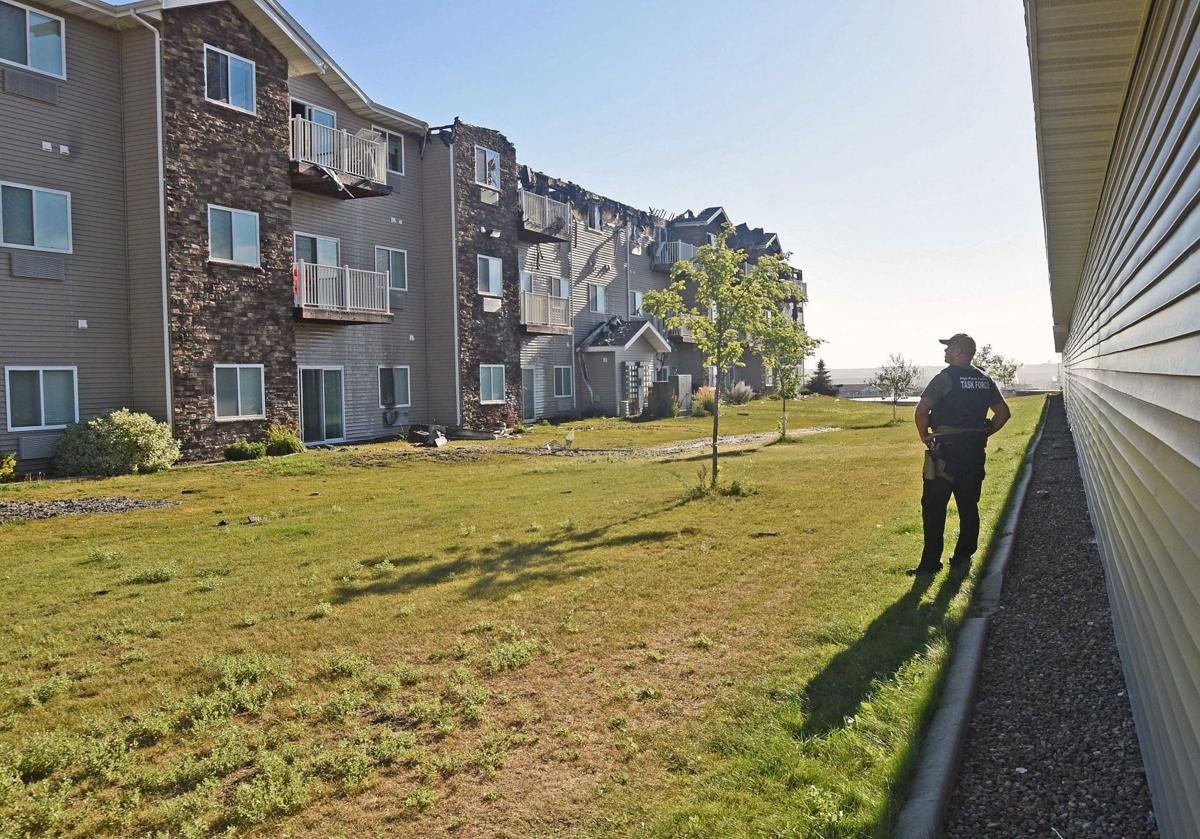 Mandan apartment building fire has similarities to blaze a year ago at