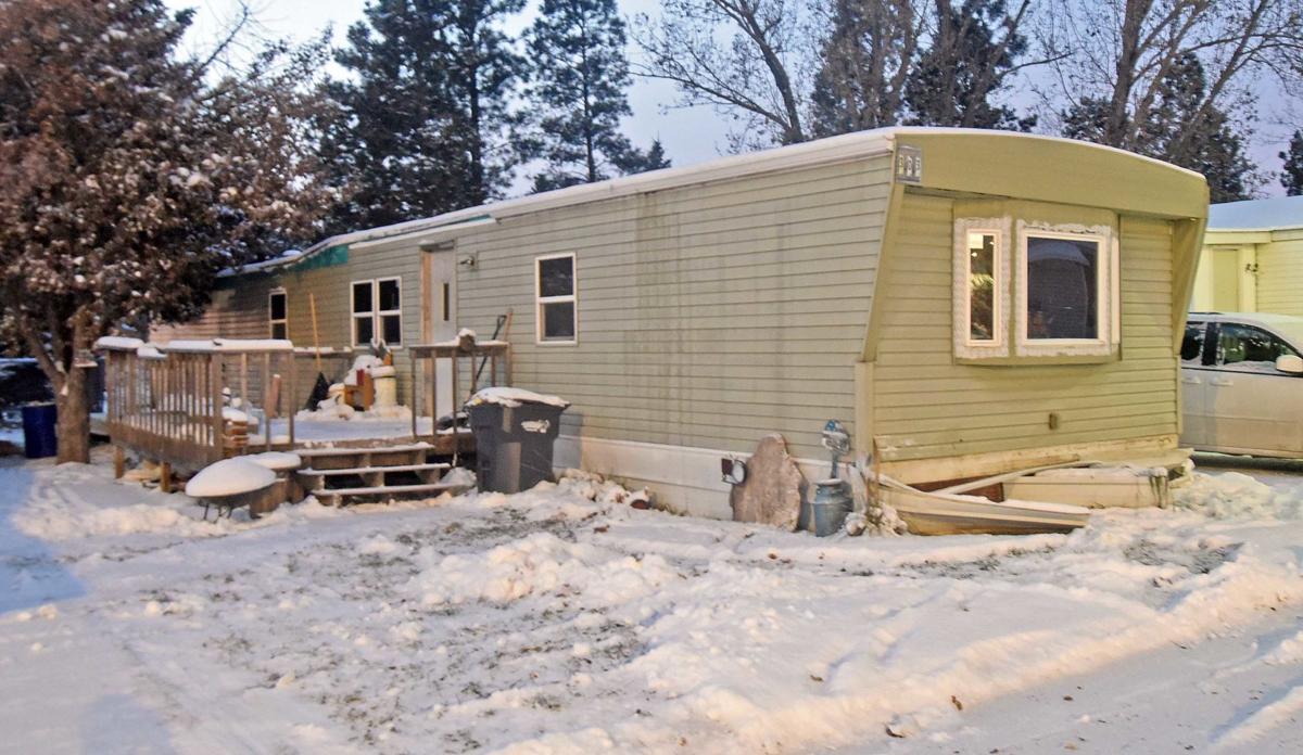 Bismarck Firefighters Save Dog While Extinguishing Mobile Home