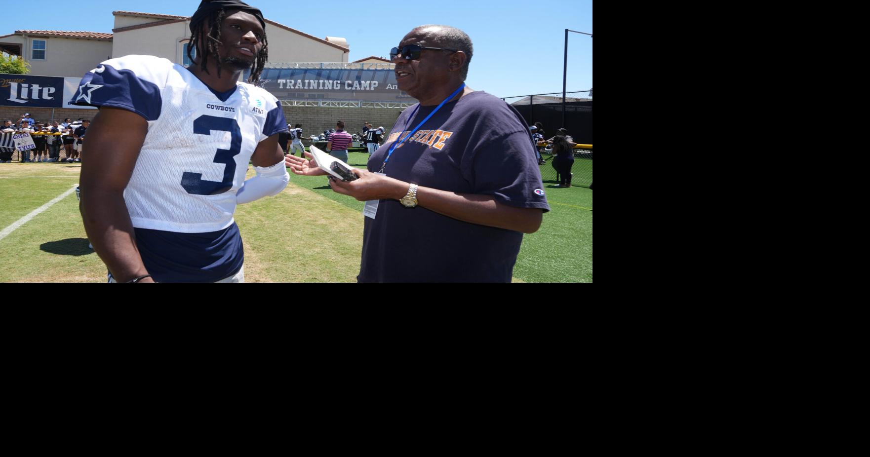 Jul 27, 2025; Oxnard, CA, USA; USA Today Sports reporter Jarrett Bell (right) interviews Dallas Cowboys receiver George Pickens (3) at training camp at the River Ridge Fields. Mandatory Credit: Kirby Lee-Imagn Images
