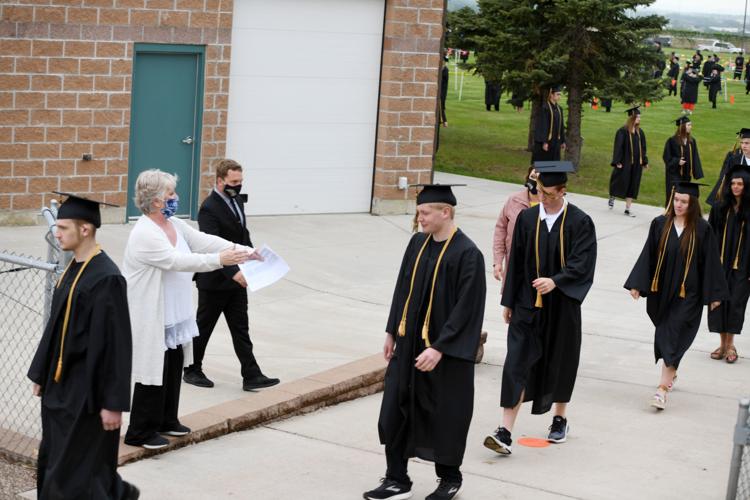 Mandan High School celebrates graduation with modified ceremony