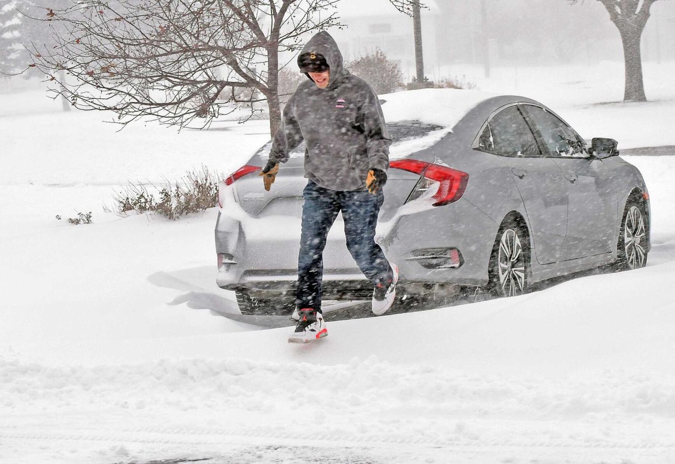 Blizzard blasts Bismarck snowfall record; Mandan totals reach 2 feet