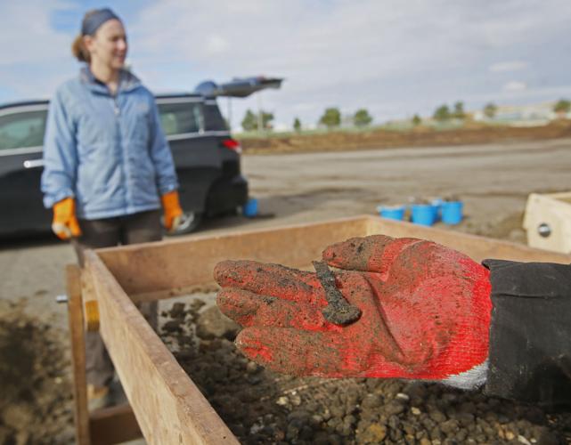 Archaeologists find toys, bottles and debris of daily life at former