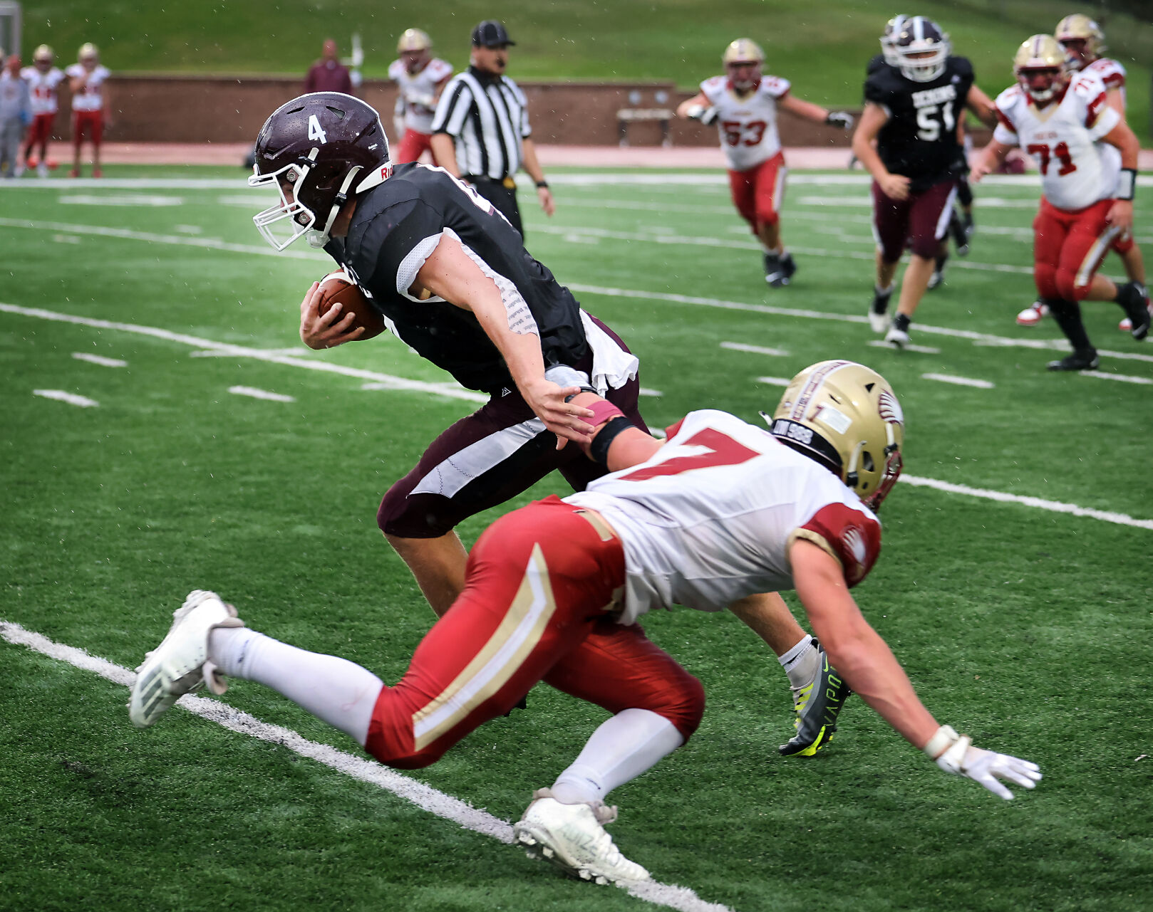 Bismarck Demons overpower Fargo Davies with big passing plays in a rainy Homecoming game