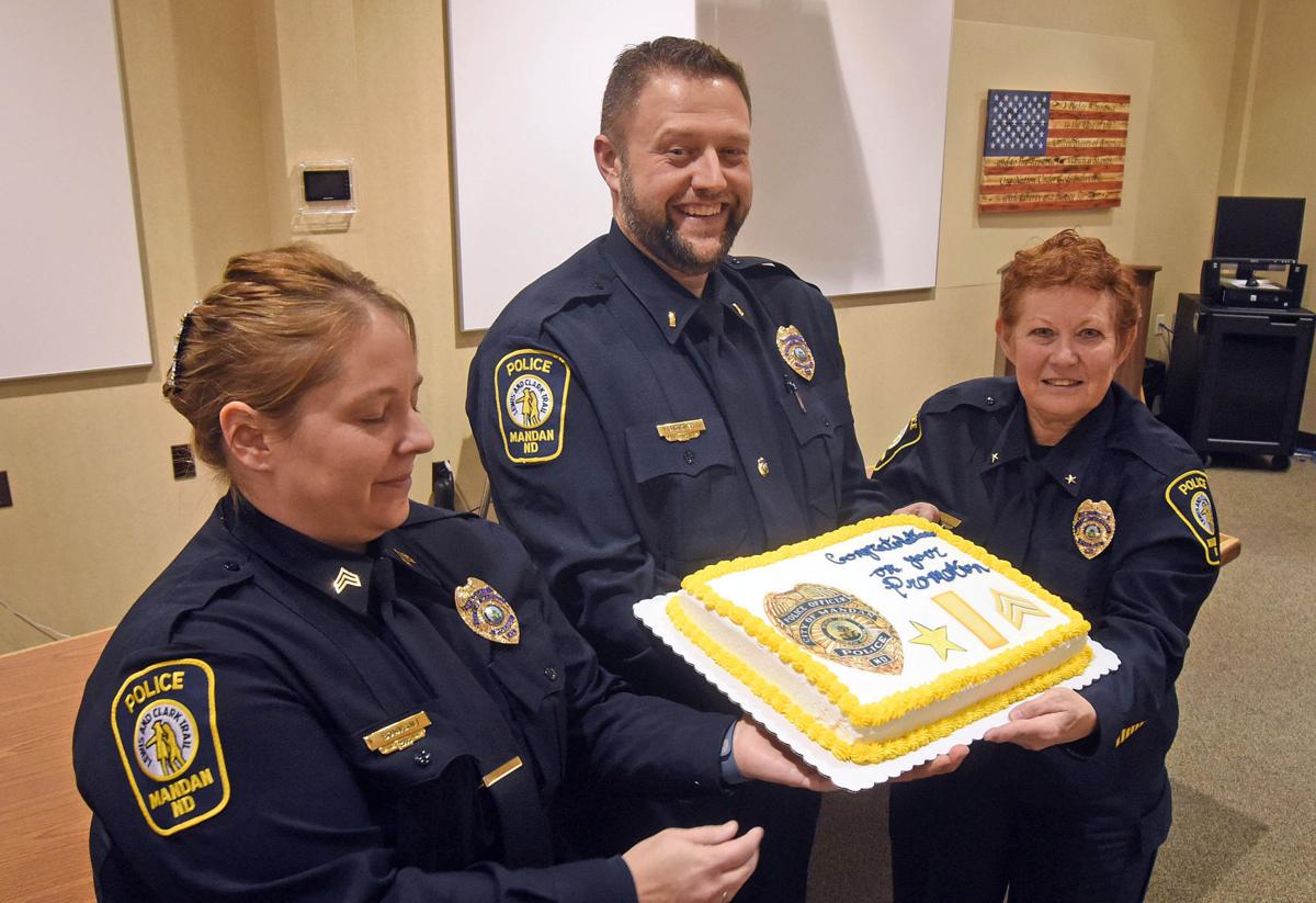 Mandan Police promote 3 officers Mandan