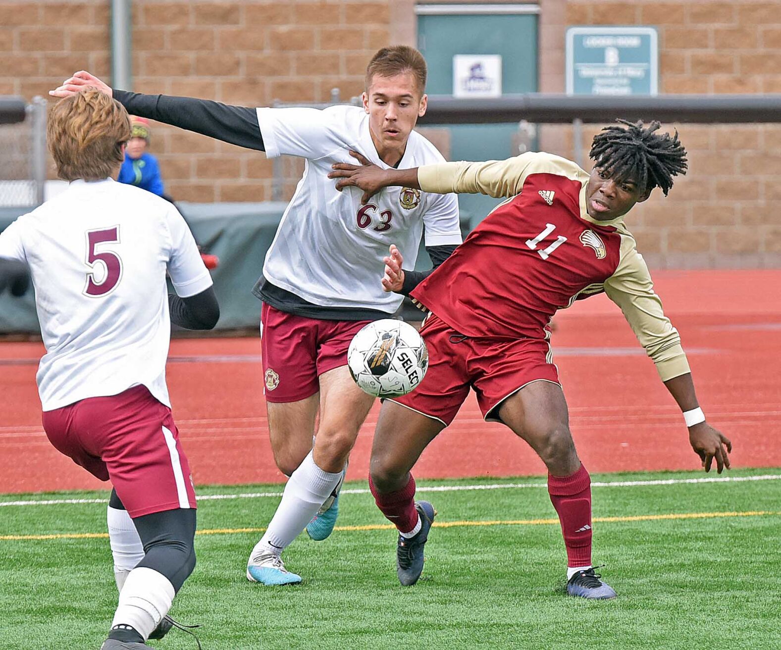 Brayden Oswalt leads Minot Magicians to 3-1 victory over Fargo Davies in state boys soccer semifinals
