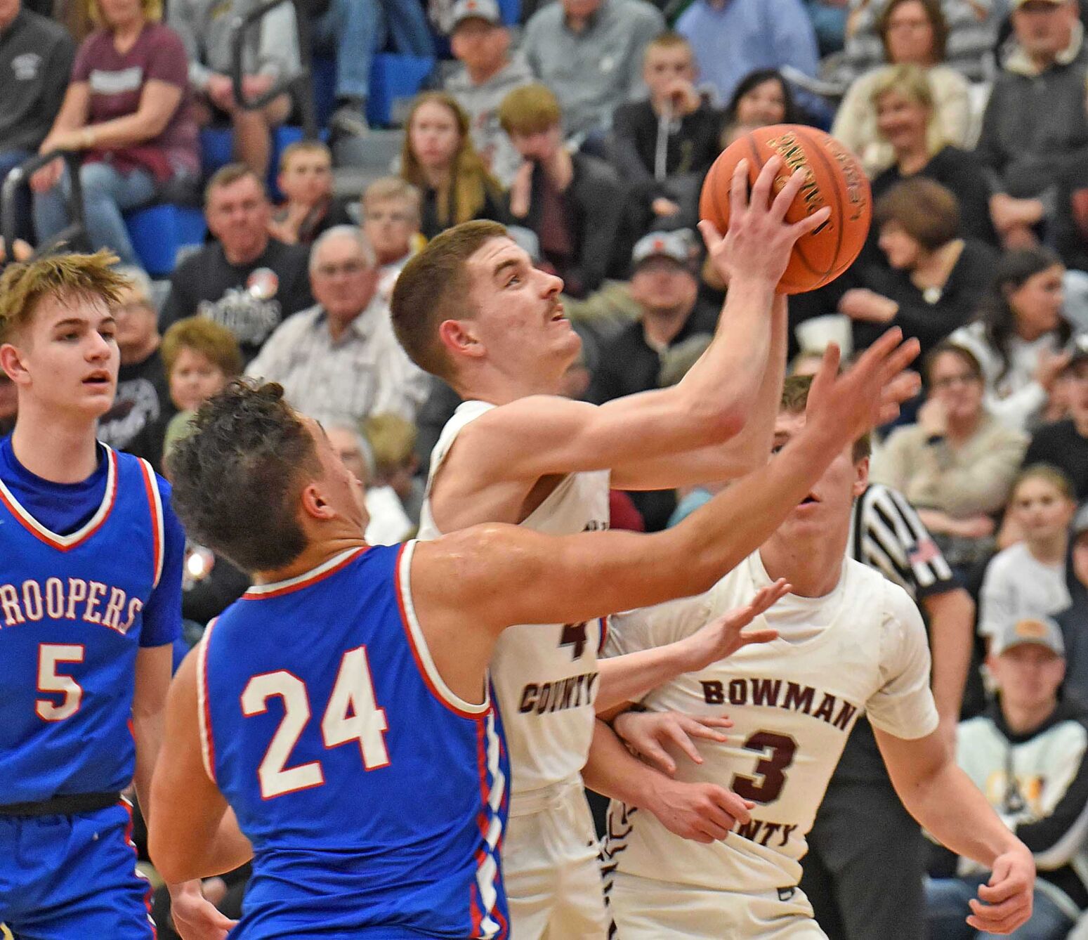 Bismarck High and Other Basketball Teams Compete in Region Tournaments and State Qualifiers