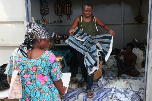 The colourful woven traditional tunic originating from northern Ghana is worn by both men and women