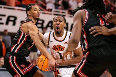 No. 14 Houston holds down Oklahoma State in Big 12 opener
