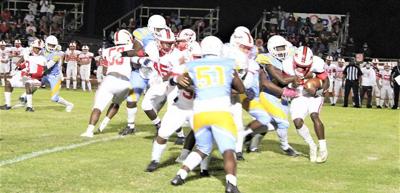 Saints defense sparks playoff win over Carroll