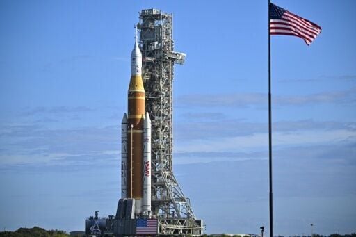 NASA's Artemis II Space Launch System rocket and Orion spacecraft are rolled out to Launch Pad 39B at Kennedy Space Center in Florida ahead of a crewed lunar mission