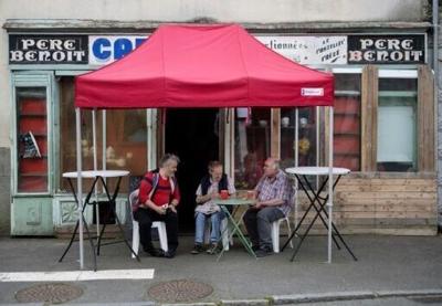 French parliament adopts bill to bring back village bars